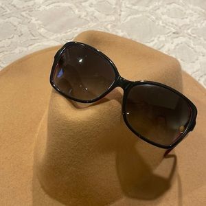 Kate Spade sunglasses with peek of pink on the inside